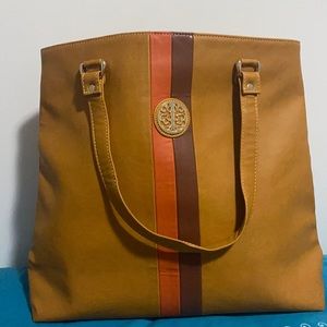 Spacious mustard bag